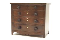 Lot 194 - A miniature mahogany chest of five drawers