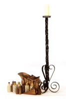 Lot 378 - A large wrought iron pricket candle stick