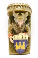 Lot 208 - French pottery wall bracket in the form of a knight supporting a rampart