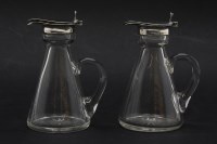 Lot 143 - Two silver and glass whisky noggins