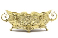 Lot 375 - A Victorian cast brass two handled bowl. 43cm long