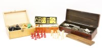 Lot 95 - A miniature ivory chess set