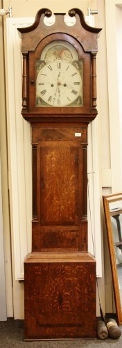 Lot 474 - An oak long case clock