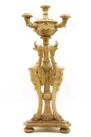 Lot 232A - A Continental carved wooden three light candelabra