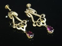 Lot 216 - A pair of gold garnet drop earrings