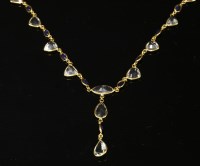 Lot 364 - An aquamarine and sapphire 'Y' necklace