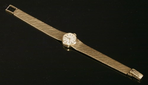 Lot 338 - A ladies' 9ct gold Omega mechanical bracelet watch