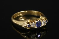 Lot 676 - An 18ct gold Edwardian sapphire and diamond boat-shaped ring