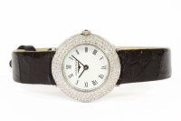 Lot 190 - A ladies 18ct white gold diamond set Longines strap watch