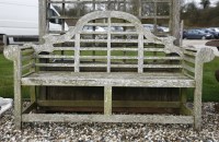 Lot 1031 - A modern Lutyens design garden seat. 167cm wide