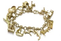Lot 135 - A 9ct gold loop bar link charm bracelet