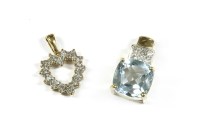Lot 107 - A 9ct gold diamond open heart shaped pendant