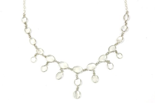 Lot 79 - A silver spectacle set moonstone cabochon fringe necklace