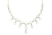 Lot 79 - A silver spectacle set moonstone cabochon fringe necklace