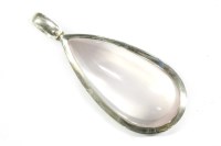Lot 18 - A silver pear shaped rub set rose quartz pendant
