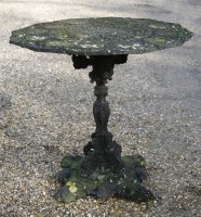 Lot 1120 - A Victorian cast iron garden table