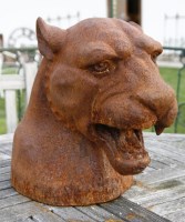 Lot 1079 - A life size cast iron bust of a roaring Puma