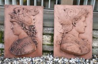 Lot 1083 - A pair of  Renaissance style terracotta wall plaques