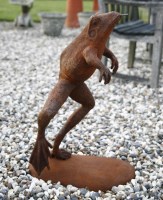 Lot 1086 - A cast iron garden figure figure of a leaping frog with fountain