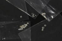 Lot 155 - A collection of unmounted diamond stones