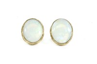Lot 129 - A pair of 9ct gold opal cabochon stud earrings
1.93g