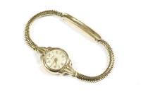 Lot 2 - A ladies 9ct gold Timor mechanical strap watch