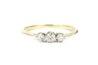 Lot 92 - A gold three stone diamond ring