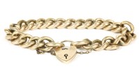 Lot 101 - A gold hollow curb link bracelet with padlock