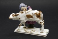 Lot 447 - A Meissen porcelain figure of a girl and a calf