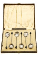 Lot 214 - A cased set of silver coffee spoons