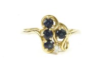Lot 30 - A gold circular sapphire and brilliant cut diamond spray cluster ring