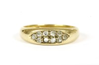 Lot 65 - An 18ct gold two row diamond cluster boat shaped ring
