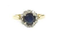 Lot 108 - A gold sapphire and diamond circular cluster ring