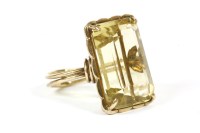 Lot 24 - A gold emerald cut citrine ring