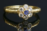 Lot 377 - An 18ct gold sapphire and diamond daisy cluster ring