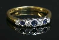 Lot 378 - An 18ct gold graduated sapphire and diamond seven stone ring