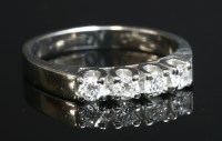Lot 454 - A four stone diamond ring