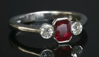 Lot 298 - An 18ct white gold ruby and diamond three stone ring