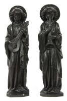Lot 469 - A pair of Pre Raphaelite style carved wooden and stained angels