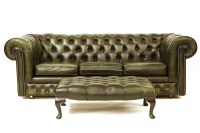Lot 623 - A green leather Chesterfield sofa