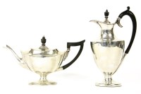 Lot 234 - An Edwardian silver teapot of navette form