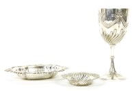 Lot 235 - A late Victorian embossed silver goblet with tied foliate swags