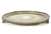 Lot 248 - An Edwardian silver circular tray by Walker and Hall