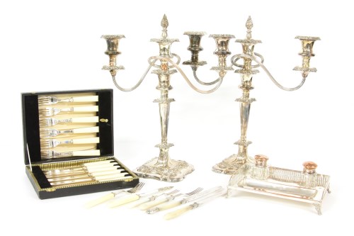 Lot 230 - Two sets of silver mounted fruit sets