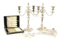 Lot 230 - Two sets of silver mounted fruit sets