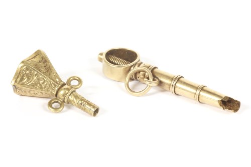 Lot 51 - A gold watch key with twist mechanism