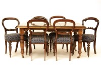 Lot 619 - An Edwardian wind out extending mahogany dining table