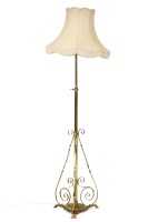 Lot 645 - A Victorian brass adjustable standard light