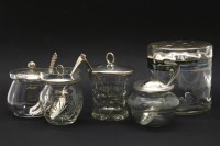 Lot 244 - Four various silver topped preserve/pickle pots
