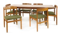 Lot 461 - A teak dining room suite